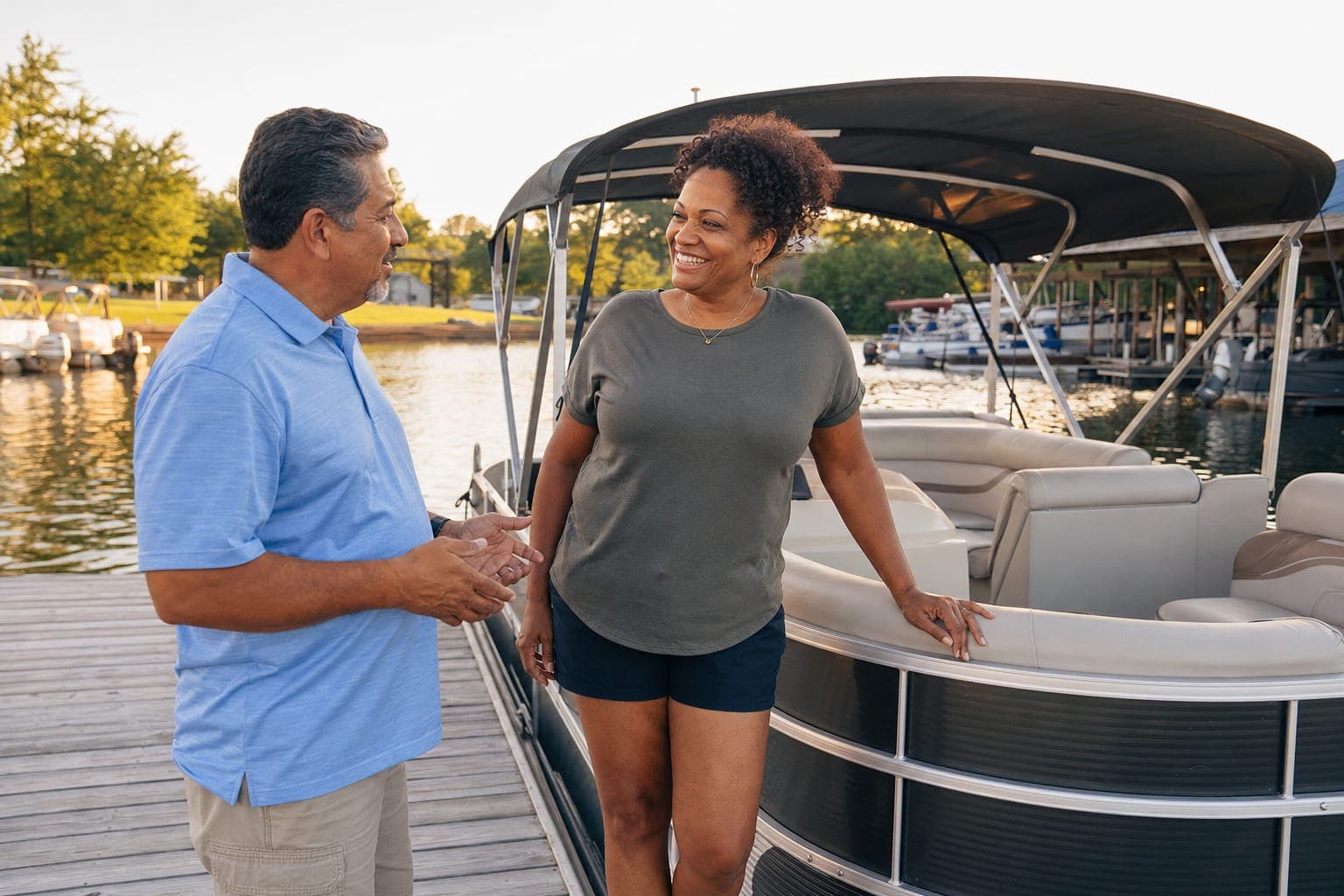Marina manager talking with a boat owner on the dock